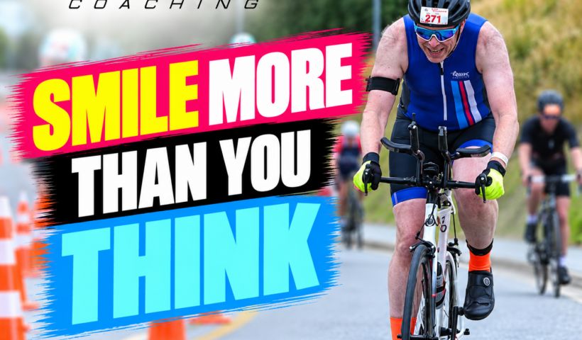 Ironman 70.3 athlete cycling with Smile More Than You Think mental strategy message